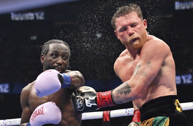 Terence Crawford beat Canelo Alvarez on points to become the undisputed super middleweight champion in Las Vegas Photo Credit: AP Photo/David Becker