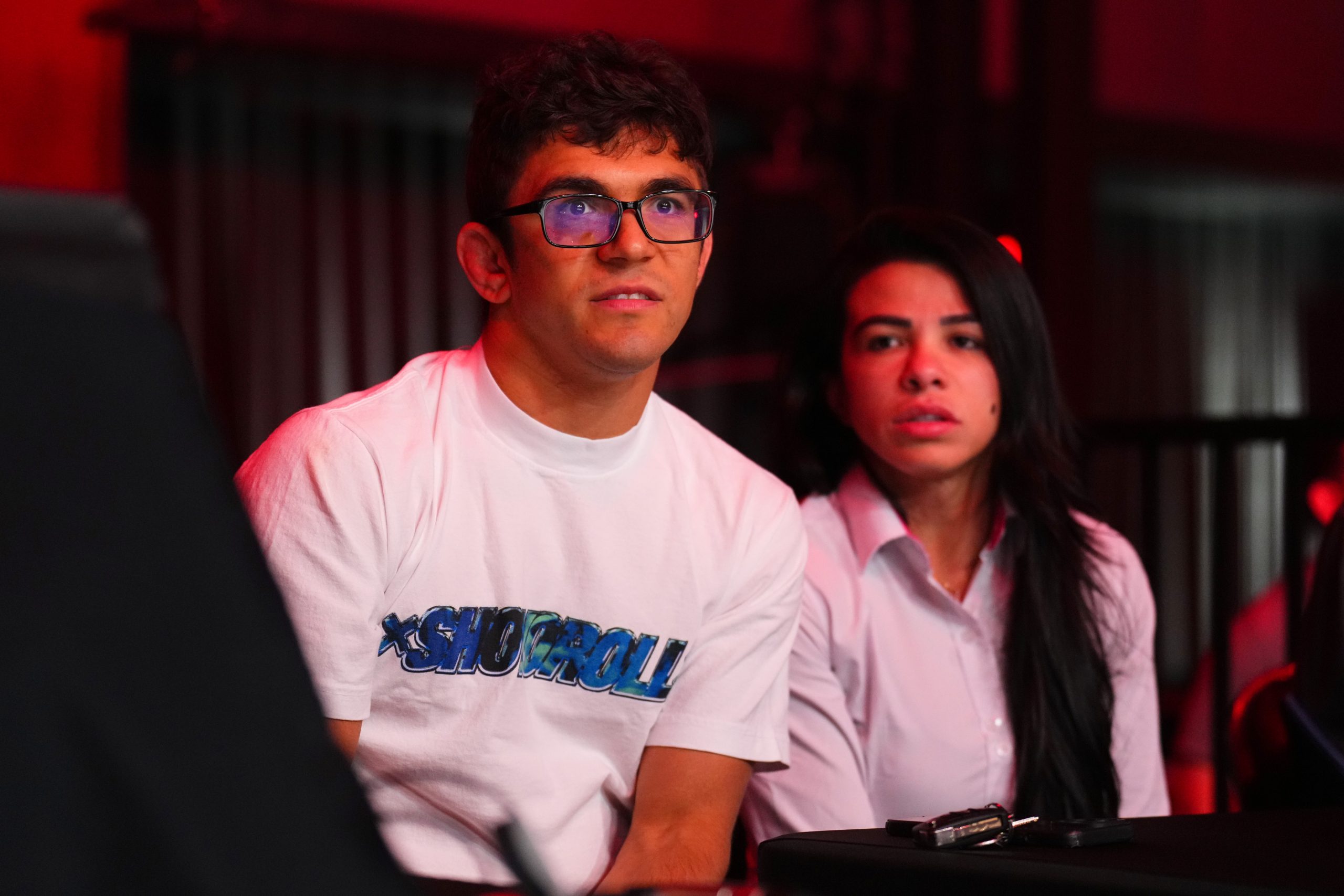 LAS VEGAS, NEVADA - OCTOBER 10: Mikey Musumeci looks on alongside Claudia Gadelha during the UFC Fight Pass Invitational 8 event on October 10, 2024 in Las Vegas, Nevada. LAS VEGAS, NEVADA - OCTOBER 10: Mikey Musumeci looks on alongside Claudia Gadelha during the UFC Fight Pass Invitational 8 event on October 10, 2024 in Las Vegas, Nevada.