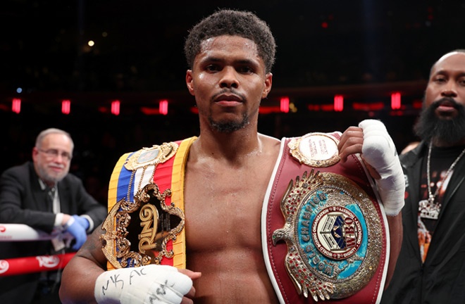 Stevenson celebrates winning the WBO and Ring super lightweight titles Photo Credit: Cris Esqueda Matchroom Boxing